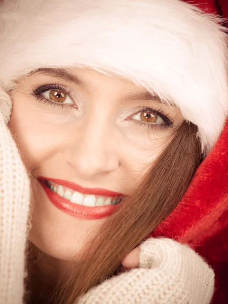 Woman wearing santa claus hat — Stock Photo, Image