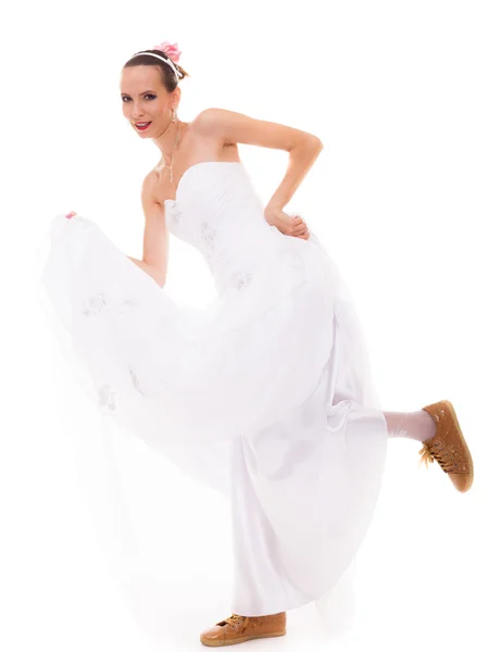 Wedding. Running bride funny woman in sport shoes — Stock Photo, Image