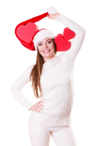 Menina feliz em santa chapéu caixa em forma de coração — Fotografia de Stock
