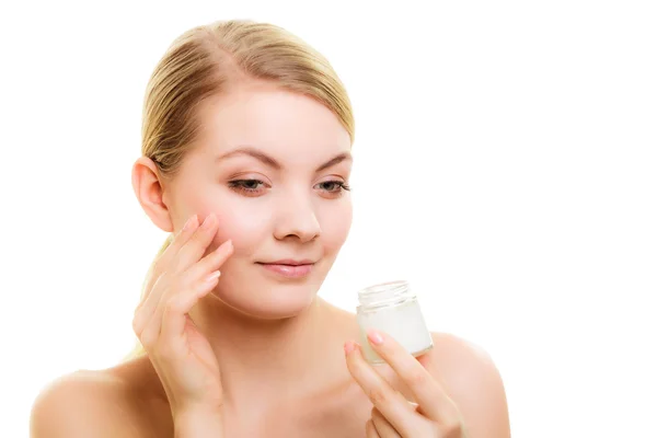 Skin care. Girl applying moisturizing cream. — Stock Photo, Image