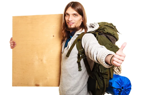 Man hiker backpacker with blank wood copy space ad — Stock Photo, Image