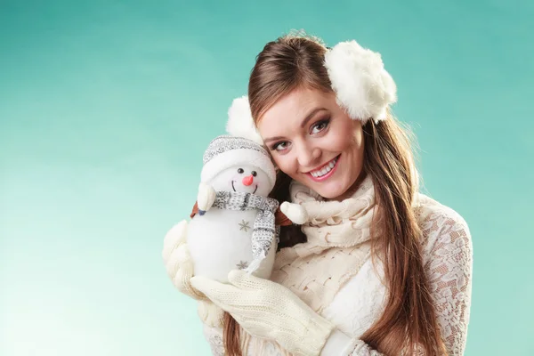 Smiling cute woman with little snowman. Winter. — Stock Photo, Image