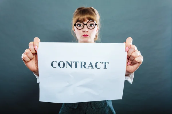 Unhappy business woman showing crumpled contract — Stock Photo, Image