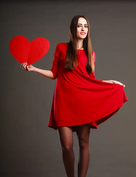 Woman holding heart symbol — Stock Photo, Image