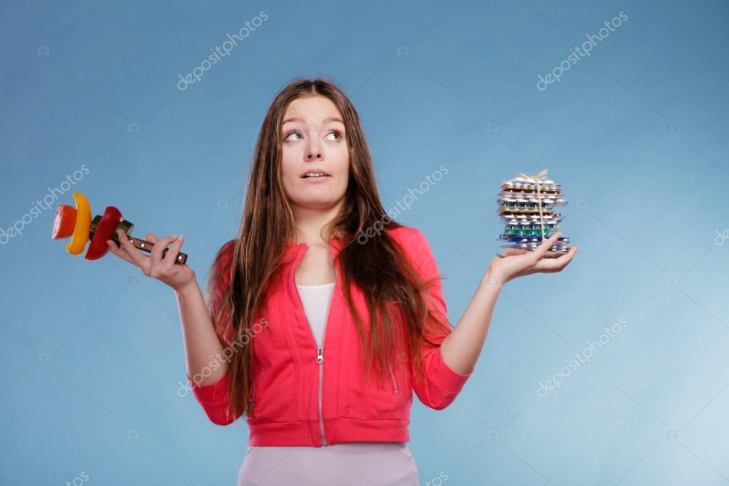 Woman With Diet Weight Loss Pills And Vegetables Stock Woman With Diet Weight Loss Pills And Vegetables Stock