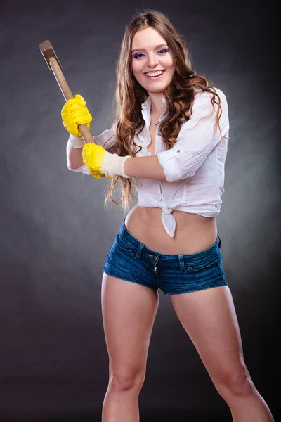 Sexy alluring woman holding hammer. Feminism. — Stock Photo, Image