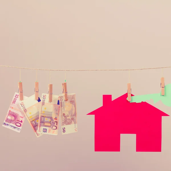 House with key and banknotes — Stock Photo, Image