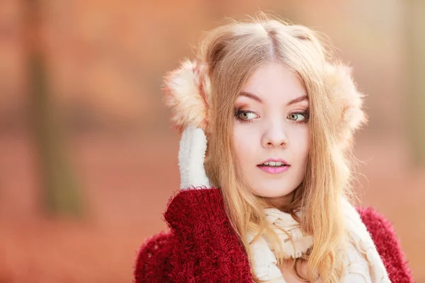 Young girl in earmuffs — Stock Photo, Image