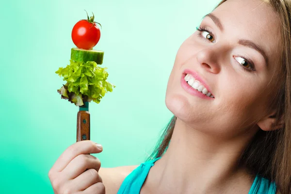 Woman holding vegetables — Stock Photo, Image