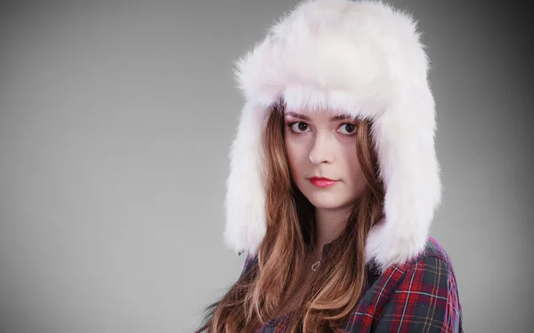 Young woman in winter clothing fur cap — Stock Photo, Image