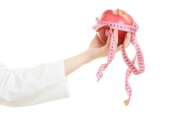 Doctor  holding  apple — Stock Photo, Image