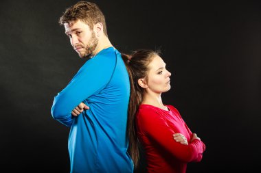 Offended couple back to back after argument. clipart