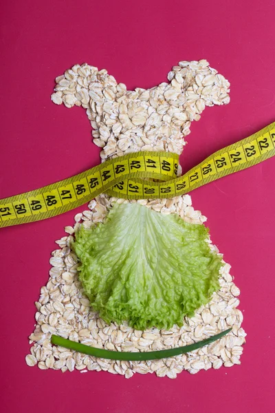 Dress shape made from oatmeal — Stock Photo, Image