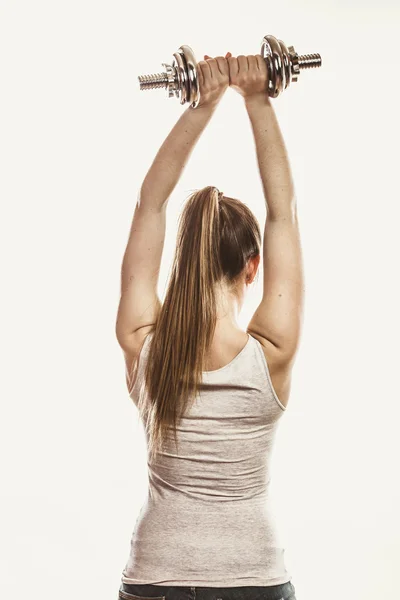 Stark kvinna lyfta hantlar vikter. Fitness. — Stockfoto