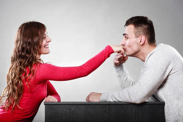 Husband kissing woman's hand — Stockfoto