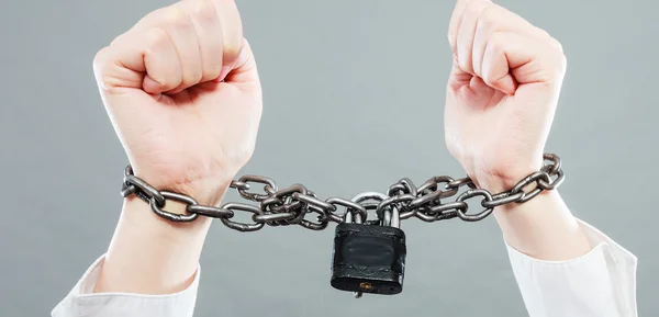 Woman with chained hands — Stock Photo, Image