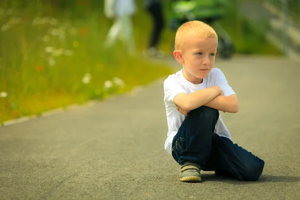 Little thoughtful boy child portrait outdoor — Stock Photo, Image