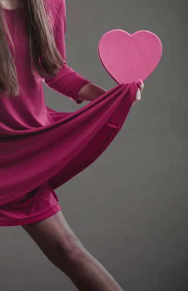 Woman holding heart sign. — Stock Photo, Image