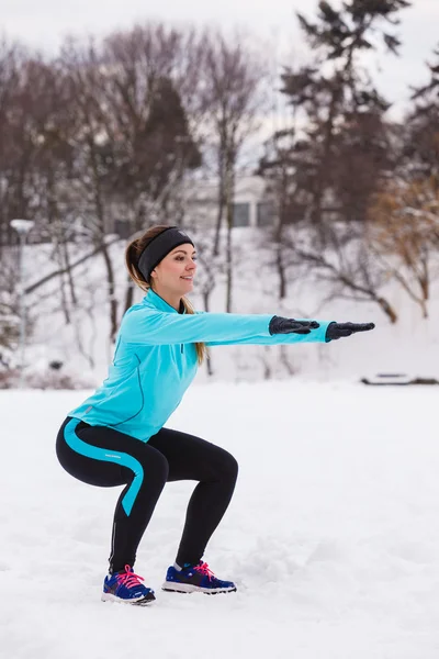 Outdoor Sport Exercises, Sporty Outfit Ideas. Woman Wearing Warm Sportswear  Running Jogging Outside During Winter. Stock Photo, Picture and Royalty  Free Image. Image 93192944.