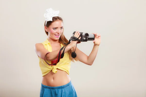 Girl filming with camcorder — Stock Photo, Image