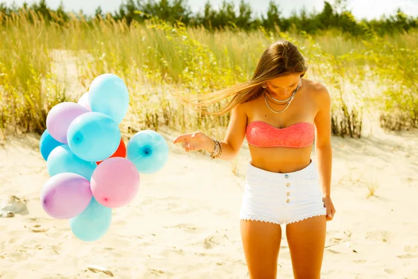 Woman  with colorful balloons — Stock Photo, Image