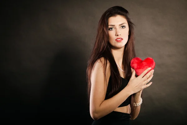 Brunette holding heart, — Stock Photo, Image