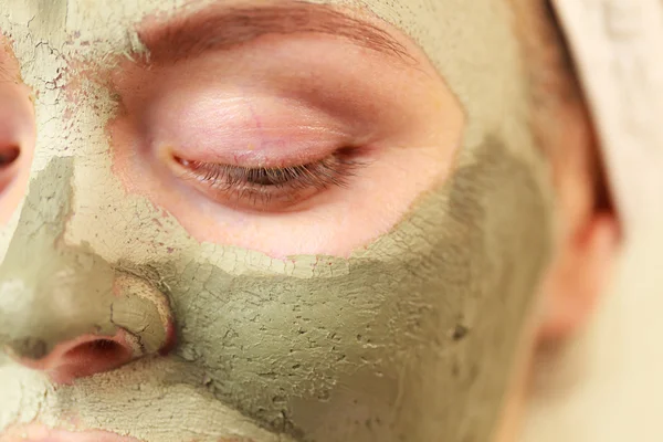Face with green clay mud mask — Stock Photo, Image