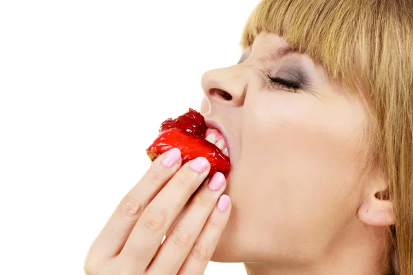 Frau isst Cupcake süßes Essen — Stockfoto