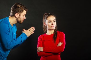 Regretful man husband apologizing upset woman wife clipart
