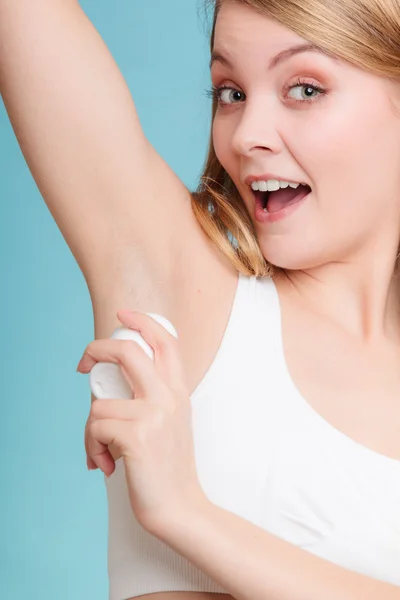 Girl applying stick deodorant — Stock Photo, Image