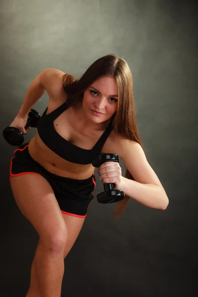 Mujer haciendo ejercicio con pesas —  Fotos de Stock