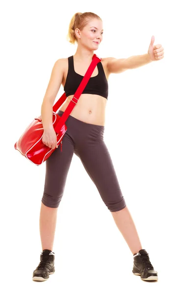 Sport. Fitness girl with gym bag showing thumb up — Stock Photo, Image