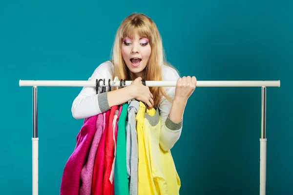 Woman  grabbing clothing — Stock Photo, Image