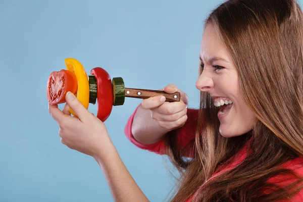 Girl holding vegetables. — Stock Photo, Image