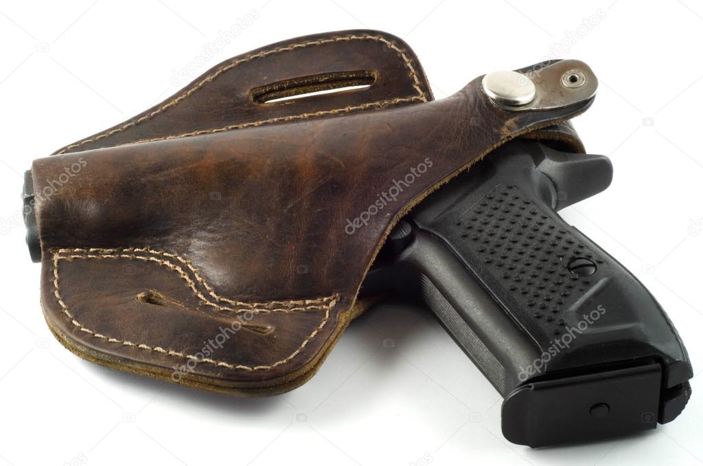 close view of handgun in holster