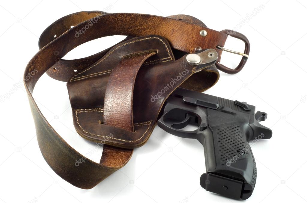 close view of handgun in holster