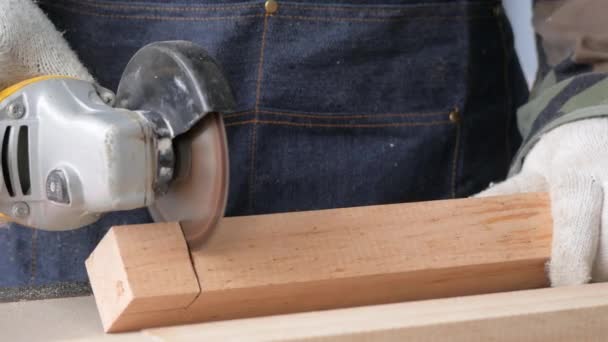 Man Using Grinding Machine Sawing Cutting Wooden — Stock Video