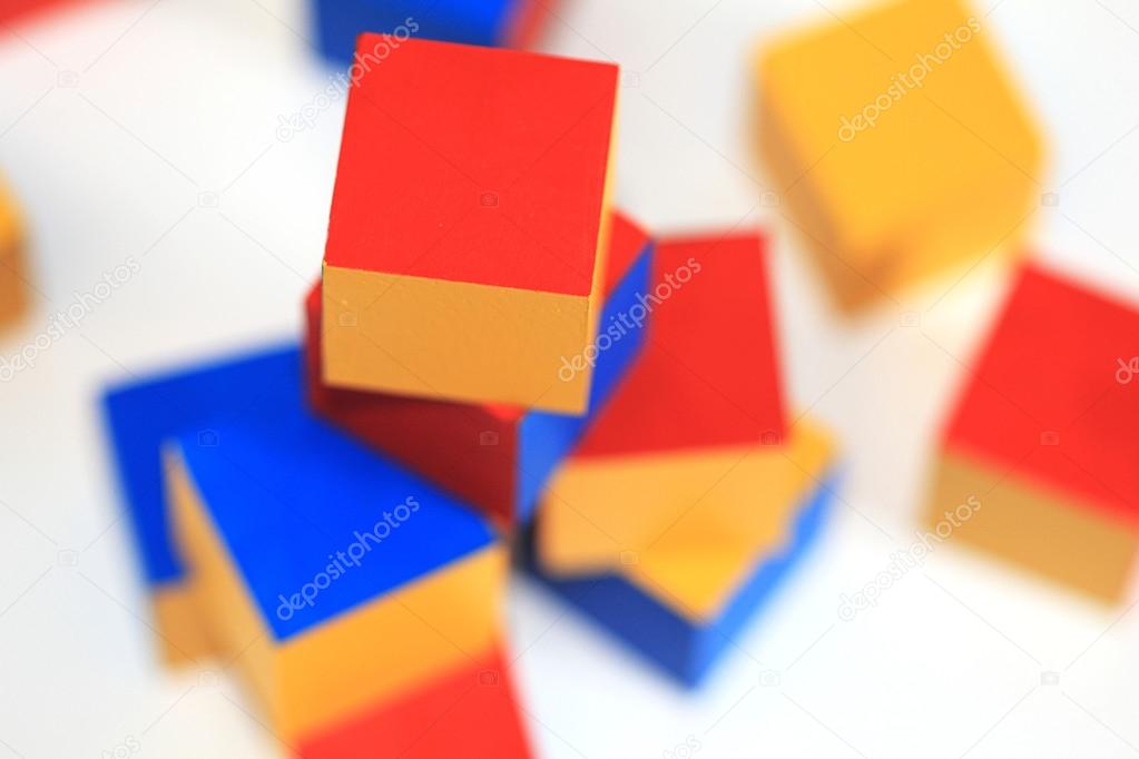 Wooden toy. Colorful brick.