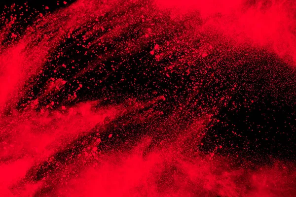 Piros Részecske Robbanás Fekete Hátteren Freeze Mozgás Vörös Por Fröccsenés Stock Kép