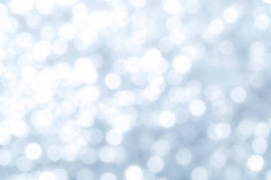 Pırıl pırıl ışıklar arka plan. Gümüş ve beyaz. Odaklanmamış