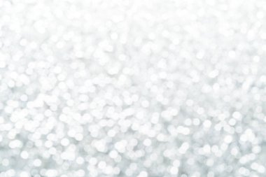 Gümüş ve beyaz bokeh ışıkları söndü. soyut arkaplan