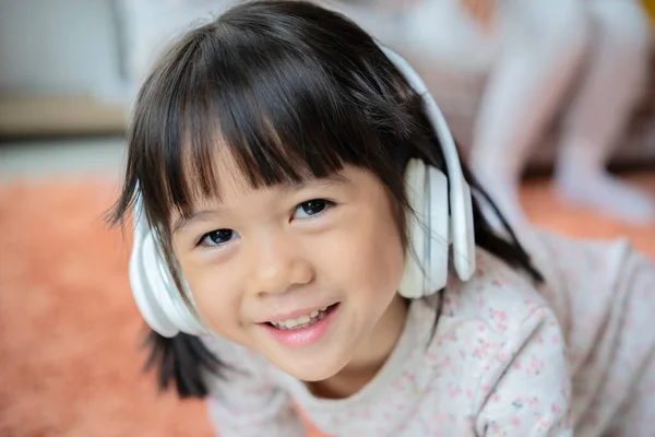Asian Little Cute Child Girl Wearing Huge Wireless Headphones Preschool — Stock Photo, Image