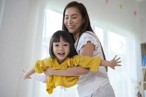 Asian Mother Daughter Have Fun Playing Together Home Woman Lifts — Stock Photo, Image