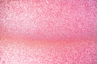 Pırıltılı altın ışıklar arka planda. gümüş ve pembe. Odağını kaybetmiş, pastel tarzı. soyut pembe arkaplan