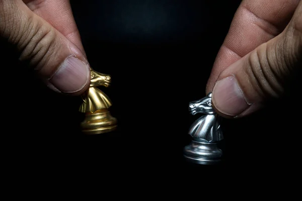 Close Man Holding Golden Silver Chess Horse Chessboard Copying Spaces — Fotografia de Stock