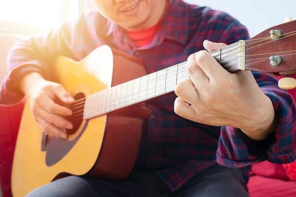 Enjoying Carefree Time Home Happy Young Man Playing Guitar While — Stock Fotó