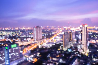 Dünya Çevre Günü konsepti: Bokeh ışığı ve bulanık modern şehir ufuk çizgisi gündoğumu arka planı. Bangkok, Tayland, Asya