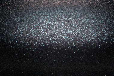 Siyah arkaplanda siyah bokeh dokusu, soyut siyah odaklanmamış