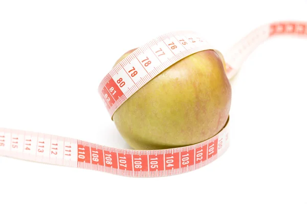 Bir metre ile yeşil elma — Stok fotoğraf