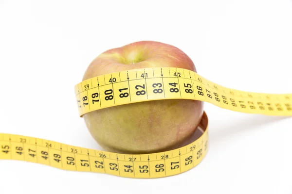 Groene appel met een meter — Stockfoto